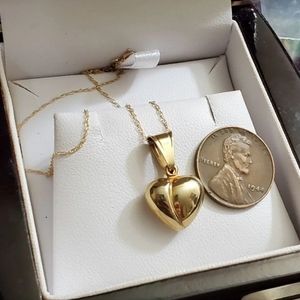 10k yellow gold puffy heart necklace! Stamped 417 (which translates to 10k) on t